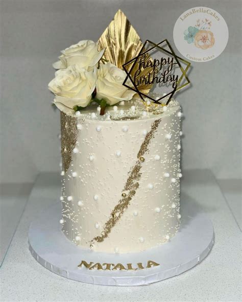 Gold Birthday Cake With Beautiful Flowers