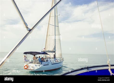 Sailing Ship Yacht With White Sail In The Open Sea Heading To Neapolis