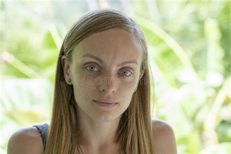 Closeup Caucasian Girl Face Portrait Of Young Woman In Nature Stock