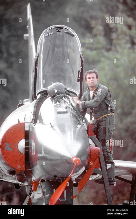 The Pilot Climbs Up To The Cockpit Of A French Air Force Mirage Fr