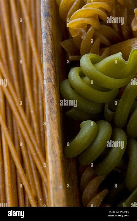 Green And Whole Wheat Pasta In Wooden Drawer Stock Photo Alamy