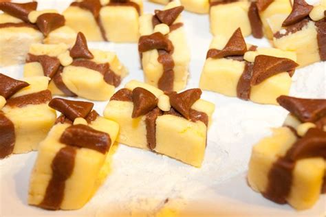 Pieces Of Cake With Chocolate And White Frosting