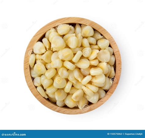 Corn Seeds In Wood Bowl On White Background Top View Stock Photo