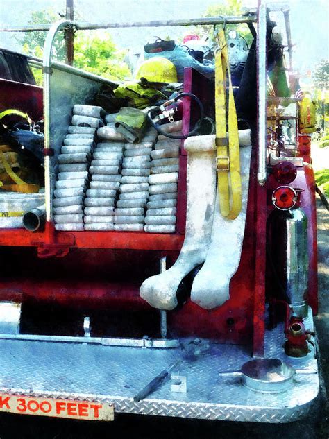 Fireman Hoses On Fire Truck Photograph By Susan Savad Fine Art America