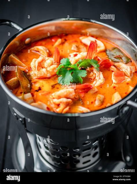 Spicy Thai Tom Yum Goong Soup In Stainless Steel Hot Pot Stock Photo Alamy