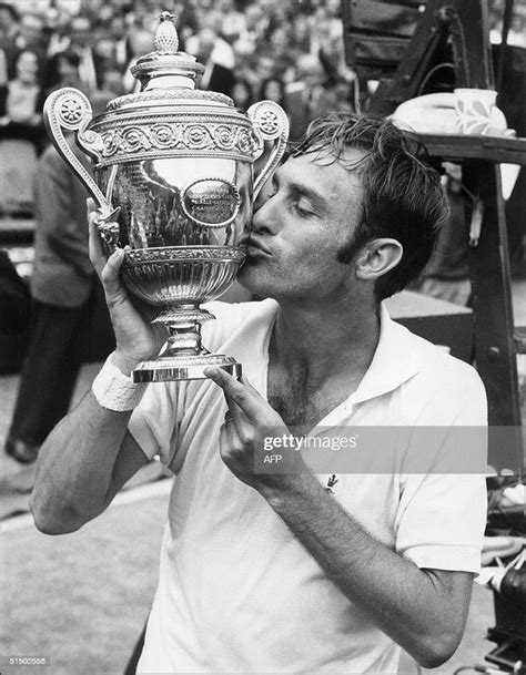 Australian Tennis Player John Newcombe Kisses The Trophy 07 July 1970