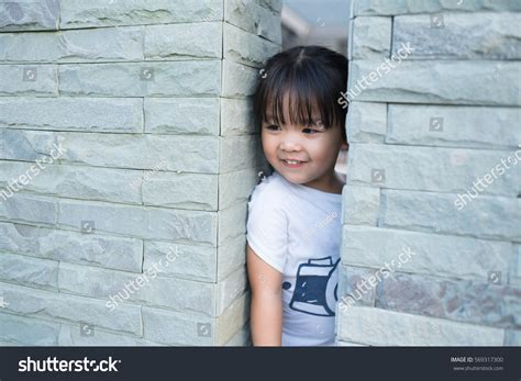 Little Girl Stuck Between Wall Getting Stock Photo 569317300 | Shutterstock