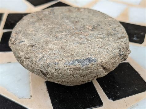 Mysterious lump of metal found under my lawn, not magnetic, no