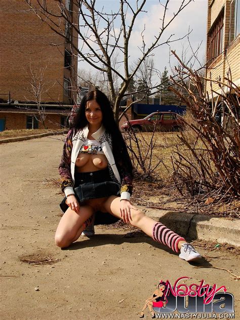 Nasty Julia Toying Her Hot Shaved Pussy In Public 13 Photos