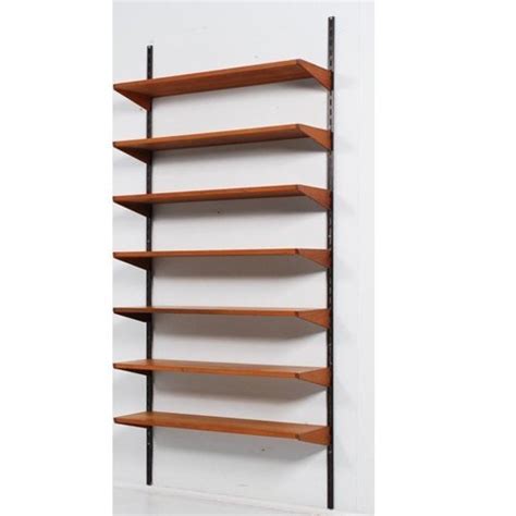 Wooden And Mild Steel Wall Mounted Display Rack For Departmental Stores