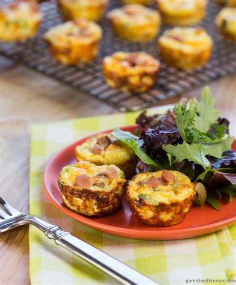 Mini Ham And Cheddar Crustless Quiches Garnish With Lemon Quiche