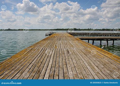 Lake dock stock image. Image of morning, skies, harbor - 20505825