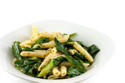 Premium Photo | Penne pasta and spinach