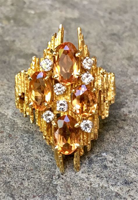 Andrew Grima Topaz Ring With Diamonds