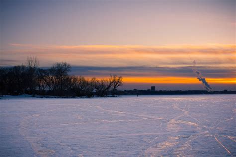 Dusk over the frozen lake landscape on Lake Mendota, Madison, Wisconsin ...