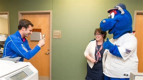 Blue Wahoos mascot Kazoo celebrates Armed Forces Day at VA Clinic