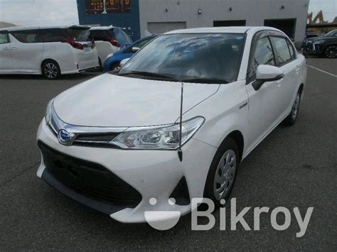 Toyota Axio X White Hybrid 2019 For Sale In Malibag Bikroy