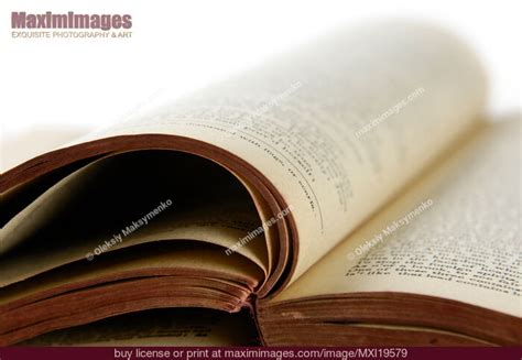 open tattered book stock photo mxi