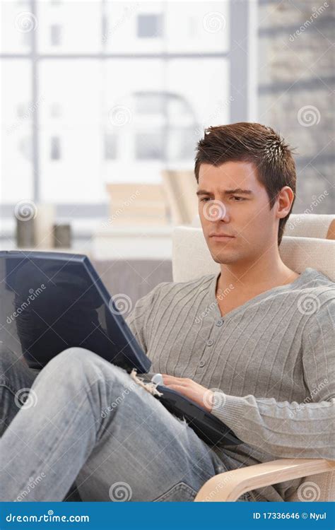 Handsome Man Concentrating On Laptop Screen Stock Photo Image Of