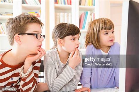 54 Kid Staring At Computer Screen Stock Photos High Res Pictures And