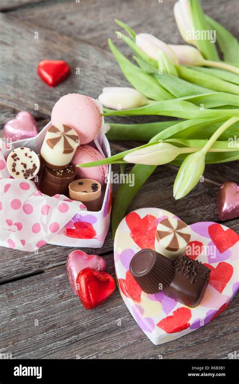 Flowers And Chocolates Stock Photo - Alamy