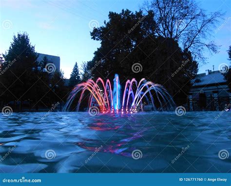 Colorful Fountain in the Night. Stock Photo - Image of grass, grape: 126771760