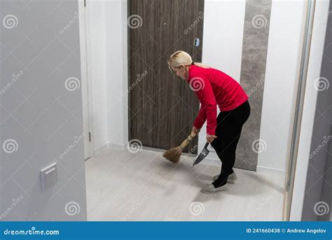 Cleaner Floor In The Building Corridor With Cleaning Tool Stock Photo