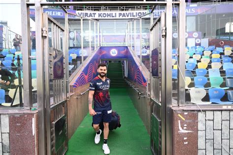 Virat Kohli Poses In Front Of The Virat Kohli Pavilion At The Arun