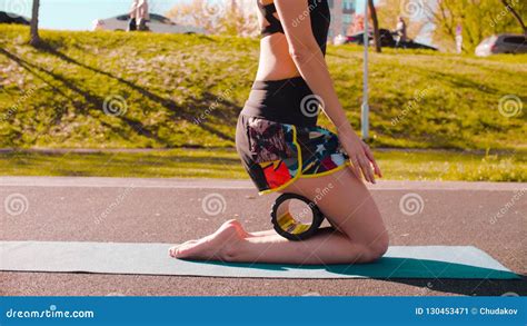 Woman Doing Self Massage Of The Legs With A Roll Stock Image Image Of