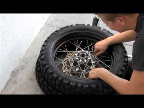 Installing A Shinko 244 On The Front Rim Of A Yamaha Wr250x YouTube