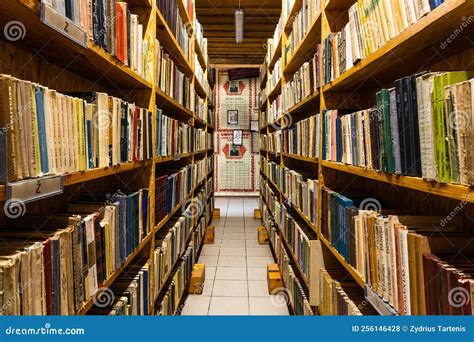 Old Vintage Books On A Wooden Shelf In The Library Editorial Stock