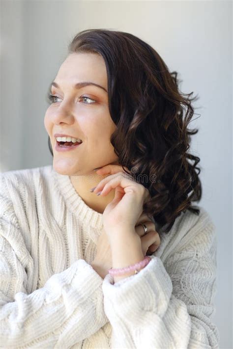 Close Portrait Of Young Happy Pleased Brunette Girl With Closed Eyes