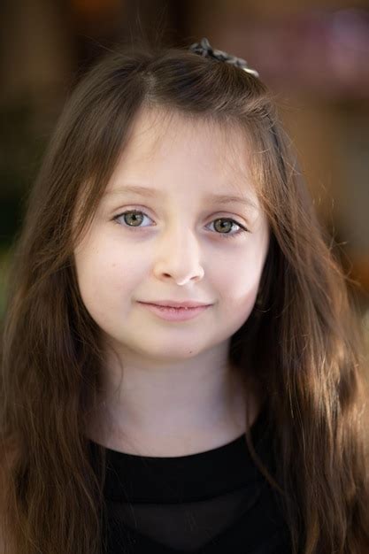 Premium Photo Close Up Portrait Of Cute Smiling Girl Outdoors