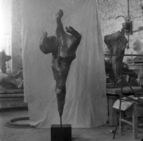 A Black And White Photo Of A Sculpture