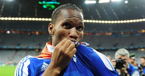 Chelsea striker Didier Drogba celebrates winning the Champions League ...