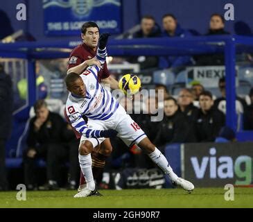 Gareth Barry Of Manchester City Tussles With Joey Barton Of QPR