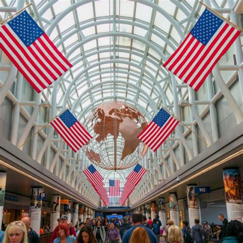 Chicago o'hare airport with travelers walking to their flights - Travel ...