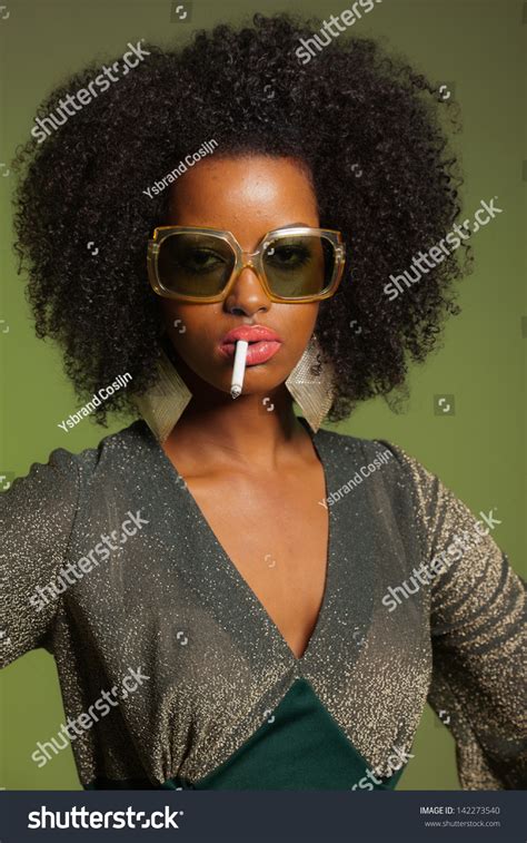 Smoking Retro 70s Fashion Afro Woman With Green Dress And Sunglasses