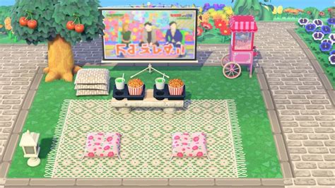 An Animal Crossing Game Is Set Up In The Grass With Food And Drinks On It