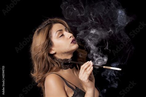 Sexy Woman With Cigarette Holder Smoking Stock Photo Adobe Stock