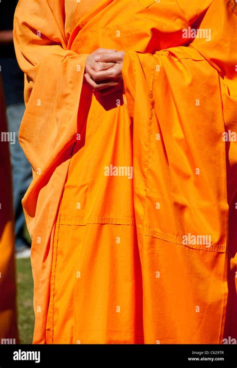 Buddhist Monk With Clasped Hands Stock Photo Alamy