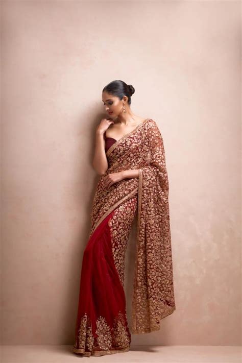 Red Velvet Saree With Golden Embroidery By Shyamal Bhumika Wedding