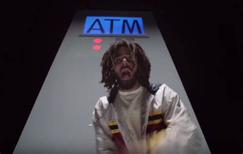 J Cole Makes Counting Money Looks Cool In Atm Video Urban Islandz