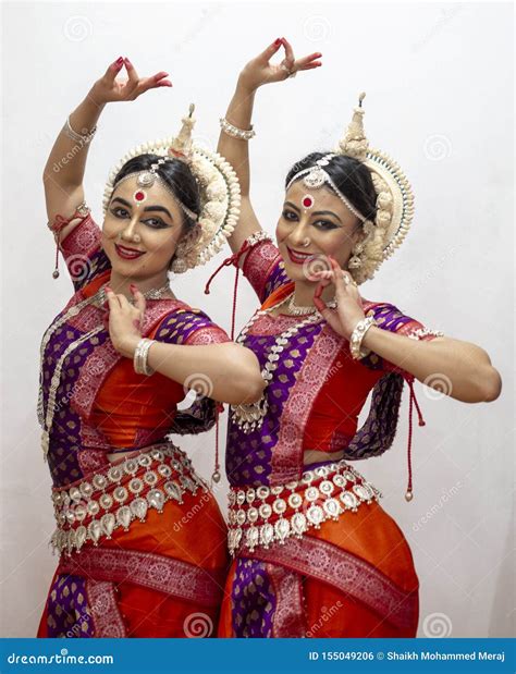 Two Beautiful Classical Odissi Dancers Performing Odissi Dance On Stage