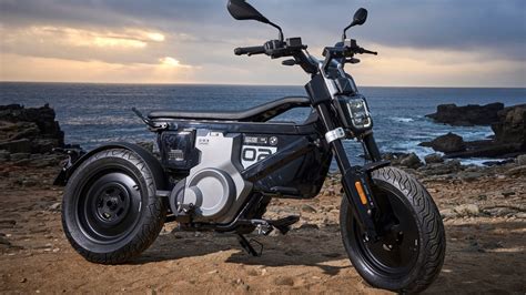 BMW unveils electric bike that zips along at 28mph, recharges from a house socket and is firm's ...