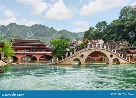 Scenic Bridges Over The Tuojiang River In Phoenix Ancient Town Stock