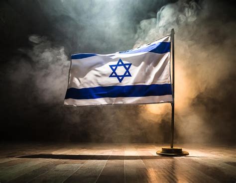 Uma Bandeira Israelense Acesa Por Um Feixe De Vela Em Uma Sala Escura E