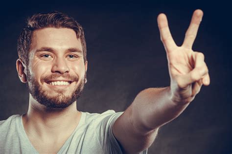 Handsome Man Guy Giving Peace V Sign Gesture Stock Photo Download