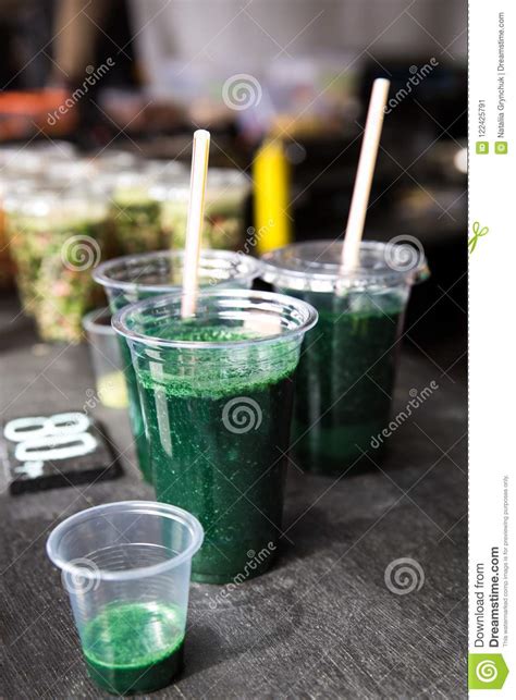 Green Smoothie Cocktail with Spirulina, Chlorella and Alga on Wooden ...