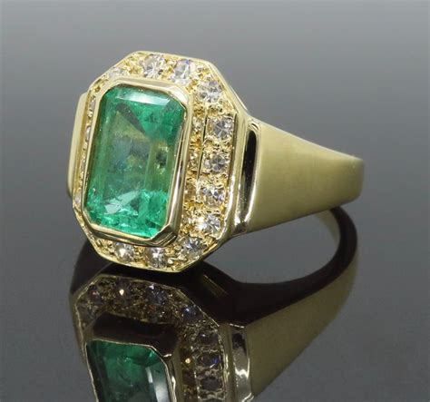 18 Karat Yellow Gold Diamond and Emerald Ring For Sale at 1stDibs